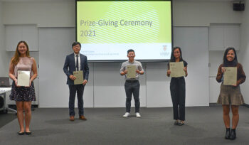 Image of graduates and prize winners